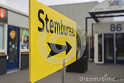 Direction sign to a polling station stembureau for the 2022 municipal elections in Zevenhuizen Editorial Stock Photo