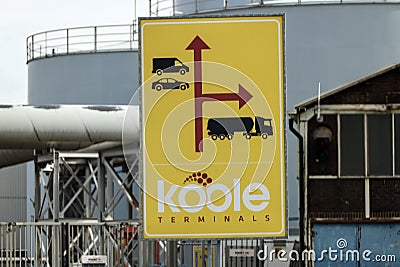 Direction sign at transport terminal of Koole at the port of Rotterdam i Editorial Stock Photo