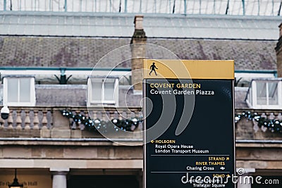 Directional signs in Covent Garden Piazza, Covent Garden, London, UK Editorial Stock Photo