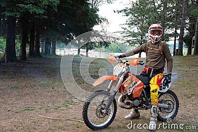 Dirt bike rider on his KTM 200 EXC motorbike Editorial Stock Photo