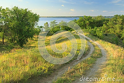 Dirt road in the hills Stock Photo