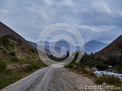 Dirt road to the mountain gorge Stock Photo