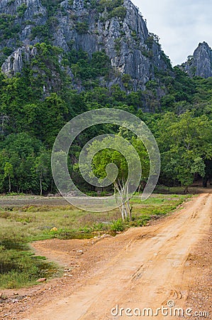 The dirt road to Khao Dang Viewpoint, Sam Roi Yod National park, Phra Chaup Khi Ri Khun Province in Middle of Thailand. Stock Photo