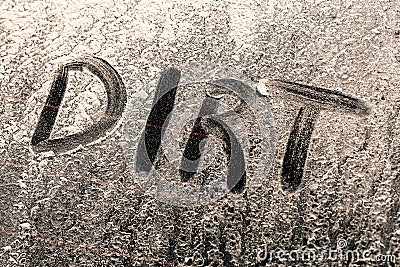 Dirt Word on a Dirty Window Stock Photo