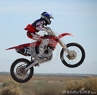 Dirtbike in mid-air. Editorial Stock Photo