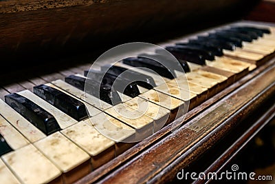 Dirty antique piano Stock Photo
