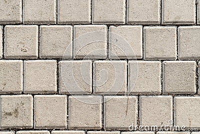 Dirty concrete footpath block texture background Stock Photo