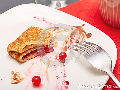 Dirty dish after pancakes Stock Photo