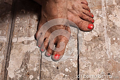Dirty female feet Stock Photo