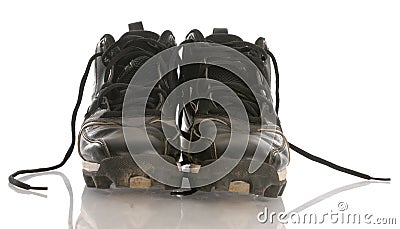 Dirty football cleats Stock Photo