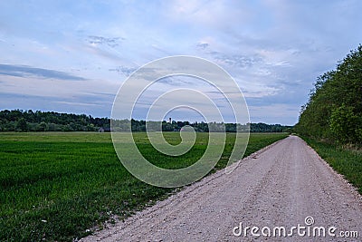 dirty gravel countryside gravel road in summer Stock Photo