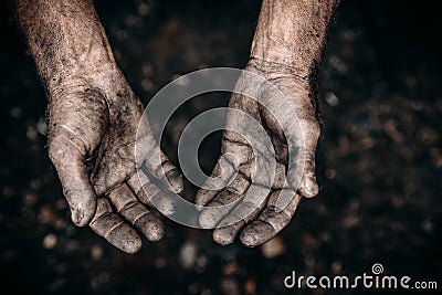 Dirty hands of worker miner are corns palms in abrasions. Concept hard work Stock Photo