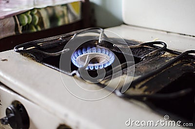 Dirty kitchen. Unsanitary conditions. Old gas stove in emergen Stock Photo