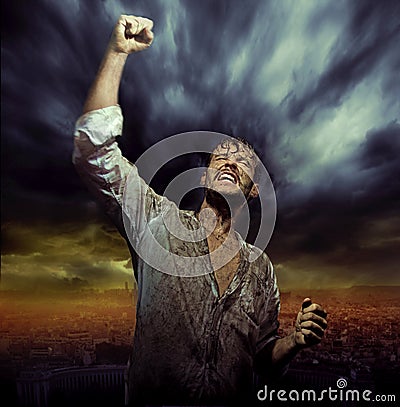 Dirty man in natural triumph pose Stock Photo