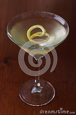 Dirty martini with a lemon twist Stock Photo