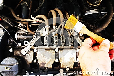 Dirty motor vehicle with brush Stock Photo