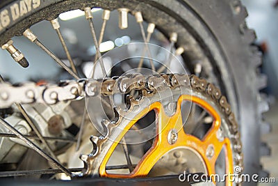 Dirty Motorcycle Chain and gear, for motocross Stock Photo