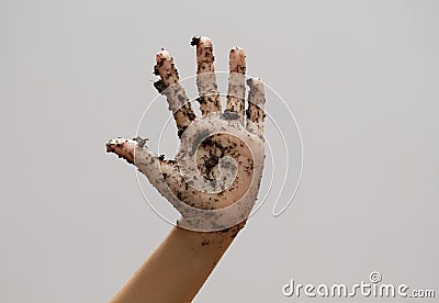 Dirty muddy hand on white Stock Photo