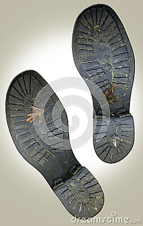 Dirty old boots foot prints Stock Photo