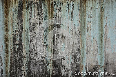 Dirty old green weathered painted wall as background Stock Photo