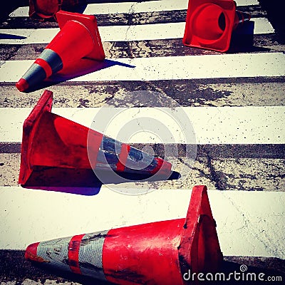 Dirty orange cones in the street Stock Photo