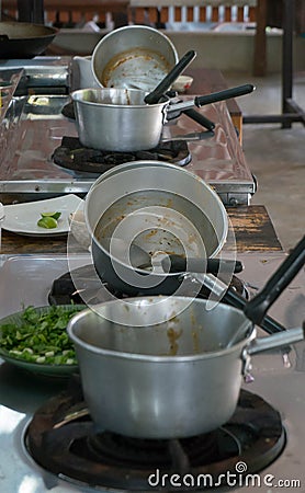 Dirty pots after cooking a meal Stock Photo