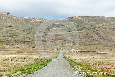 Dirty road to `Cerro Moyano` at at El Calafate - Argentina Stock Photo