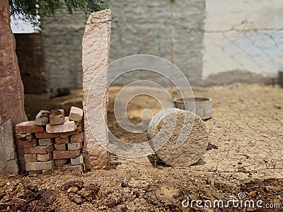 Dirty rocks and cow dung Stock Photo