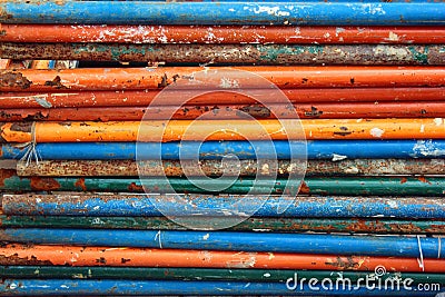 Dirty rusty steel pipes with flaking paint Stock Photo