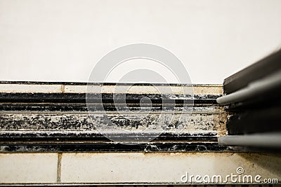 Dirty shower room. Dirty strongly stain on glass door shower room - messy bathroom concept Stock Photo