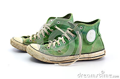 Dirty sneakers on a white background Stock Photo