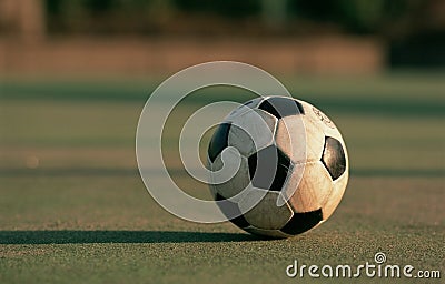 Dirty soccer ball Stock Photo