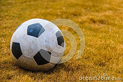 Dirty soccer ball Stock Photo