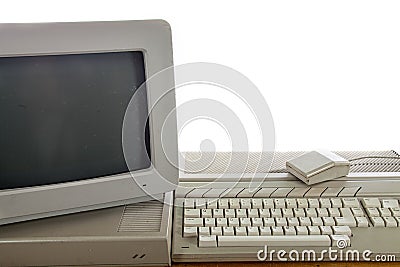 Dirty vintage home office computer system Outdated retro computing technology. Stock Photo