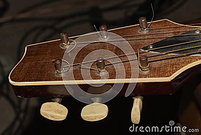 Dirty vintage old guitar fretboard. Stock Photo