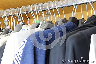 Dirty wardrobe with various women clothes Stock Photo