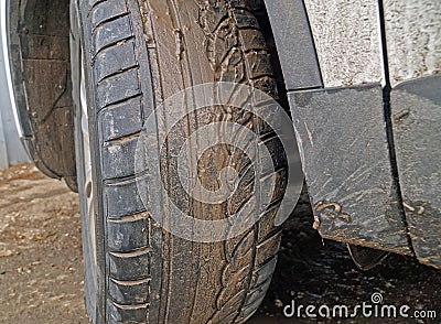 Dirty wheel of the car Stock Photo