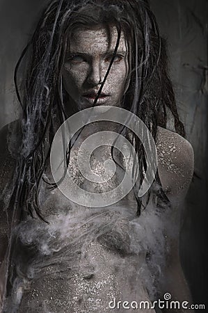 Dirty zombie woman with clay make up Stock Photo