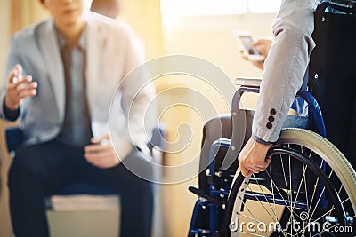 Disable businessman consult with his boos about work. Stock Photo