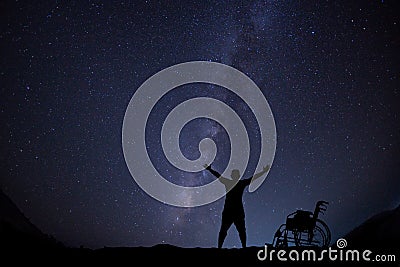 Disable man hope for freedom at night skyscape Stock Photo