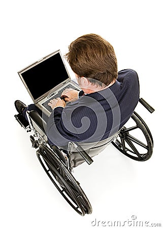 Disabled Businessman Typing Stock Photo