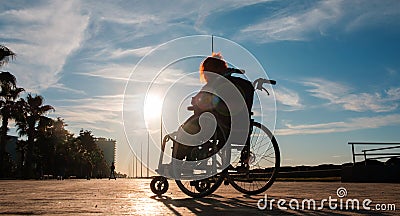 Disabled girl in a wheelchair Editorial Stock Photo