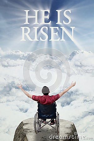 Disabled male with text of he is risen Stock Photo