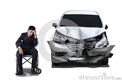 Disabled man and damaged car Stock Photo