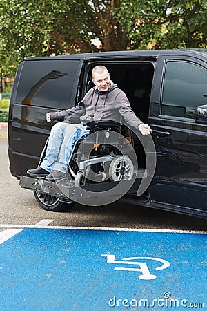 Disabled man on wheelchair lift Stock Photo
