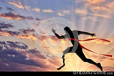 Disabled paralympic runner with prosthetic crossing finish line sunset Stock Photo