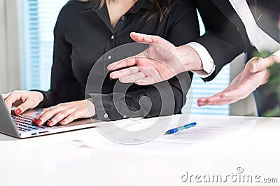Disappointed or angry boss yelling at employee. Stock Photo