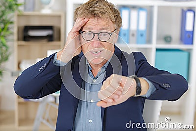 disappointed businessperson late for meeting Stock Photo