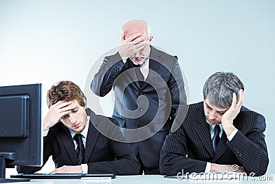 Disappointed, despondent business team Stock Photo