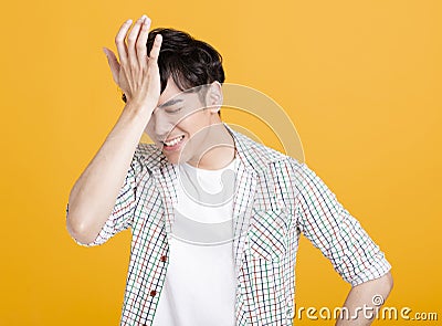 Disappointed and stressed young man Stock Photo